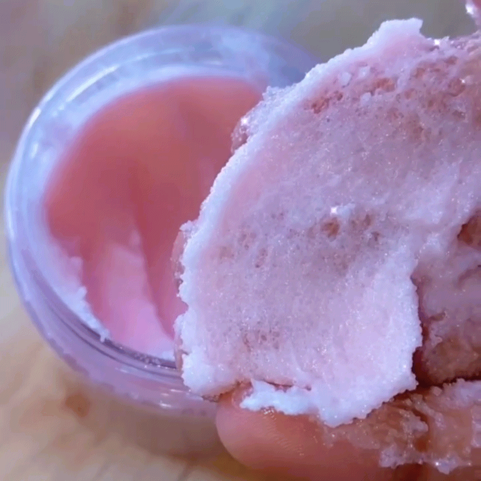 Fleurissent Rose Body Scrub with pink creamy texture for exfoliating skin.