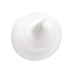 Magic Slip Detangler creamy texture for easy knot removal and softening.