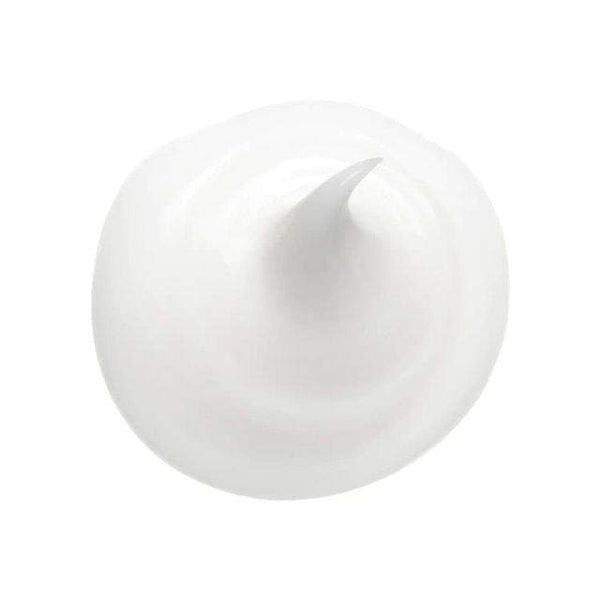 Magic Slip Detangler creamy texture for easy knot removal and softening.