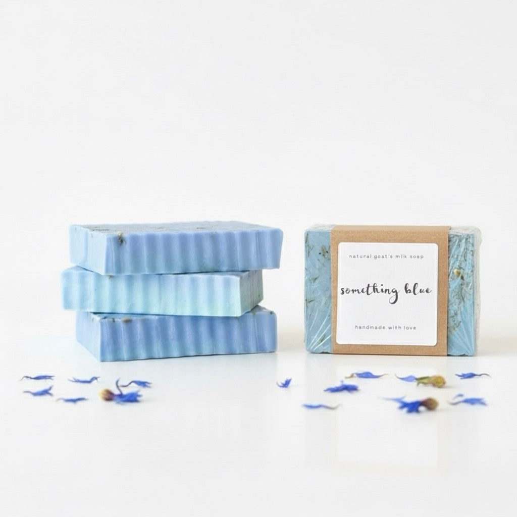 Three soap bars with striped designs on a white background